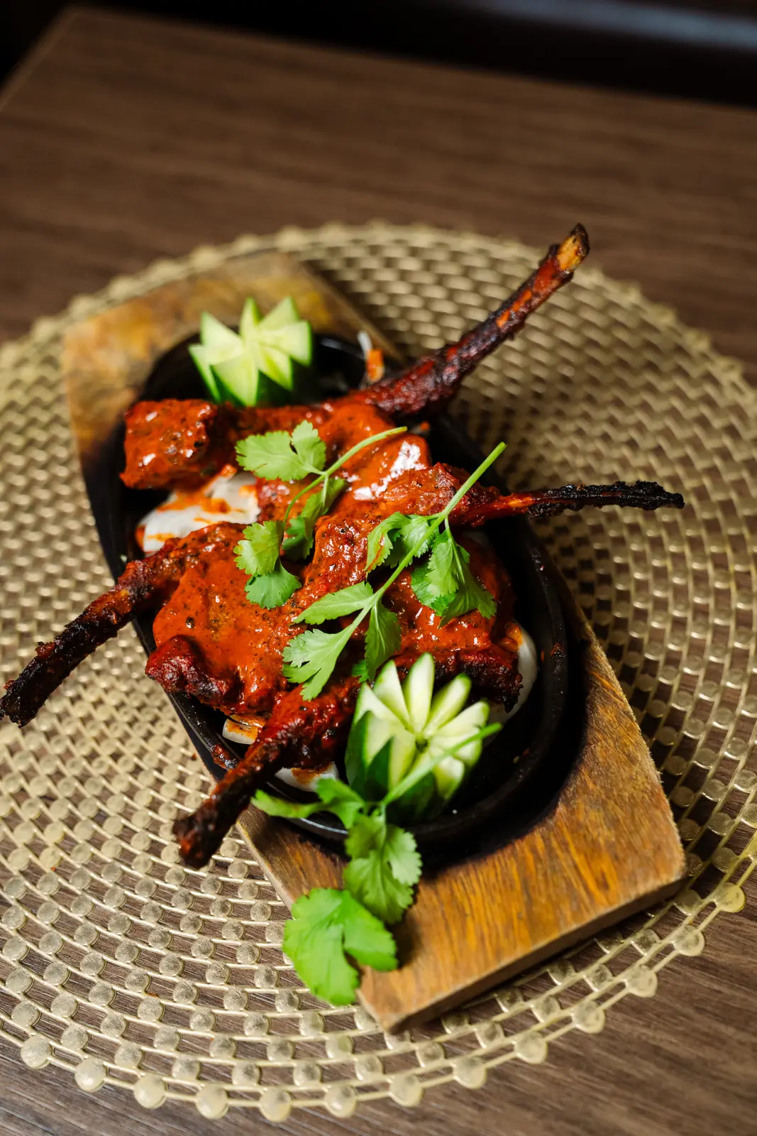 Tandoori mixed grill skewers with fresh coriander and cucumber